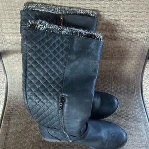 Women’s black knee high flat boots